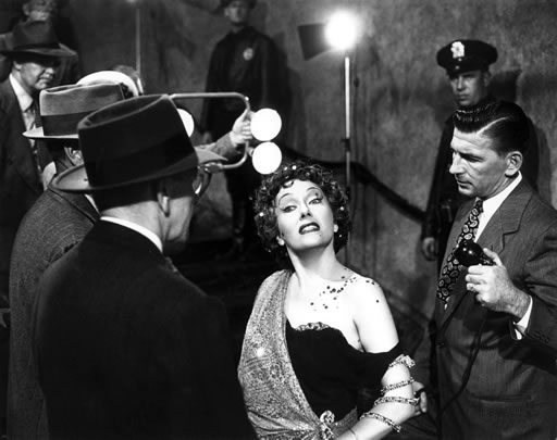 to those who have not experienced Sunset Boulevard, Miss Gloria Swanson, 